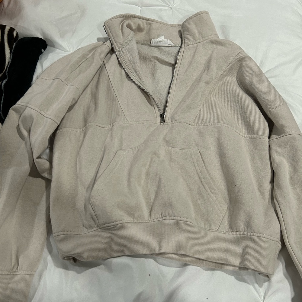 Tan zip up